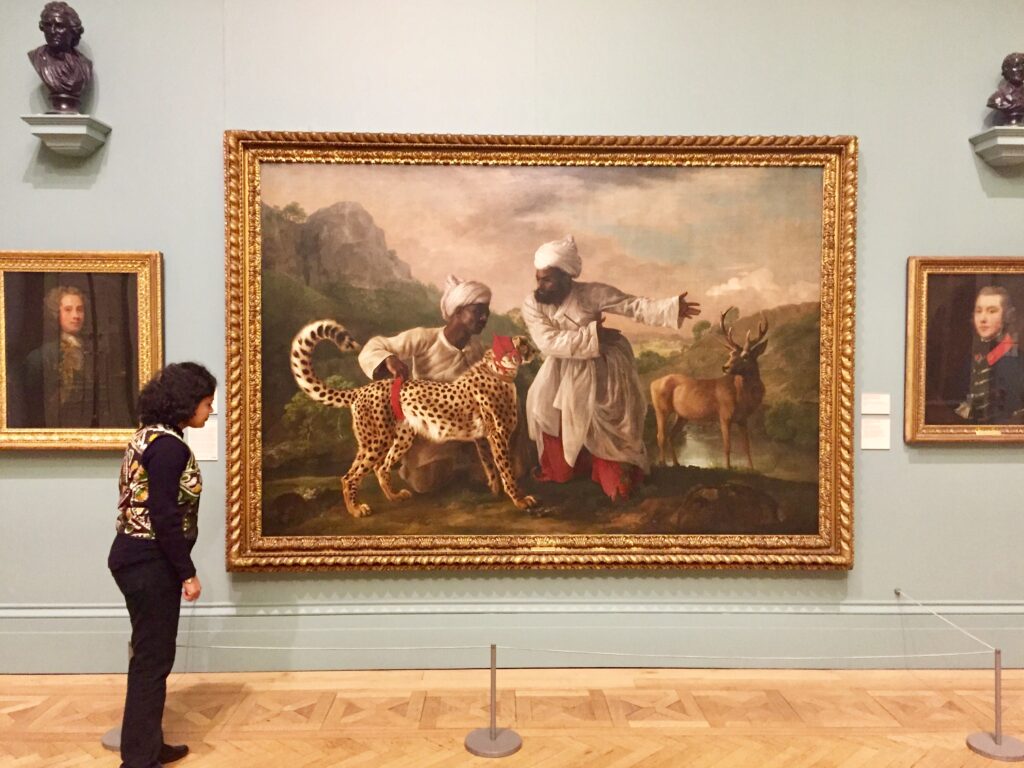 Joyee observing the painting 'Cheetah and Stag with Two Indians' by George Stubbs