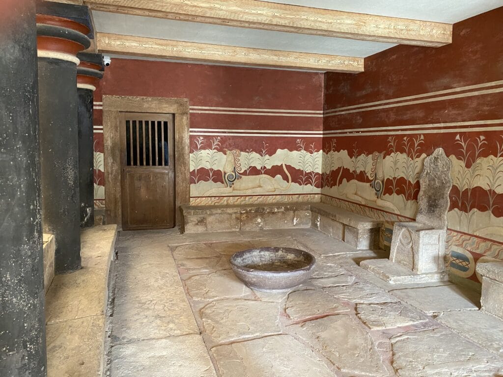 Ancient room with red walls at archaeological site of Knossos