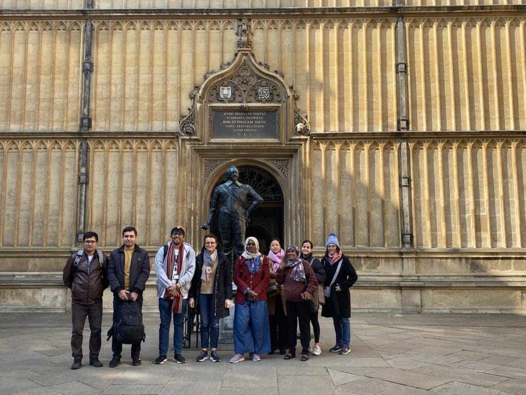 A group of people outside the Bodleian Library, Oxford