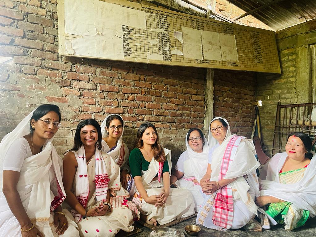 women of generations during a religious affair called 'Naam' in one of the Namghars of Assam. 