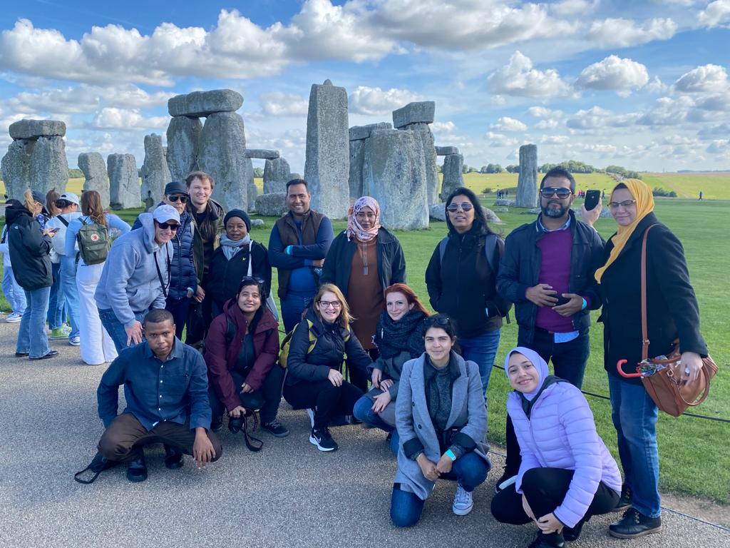 ITP 2022 fellows take a group photo in front of Stonehenge