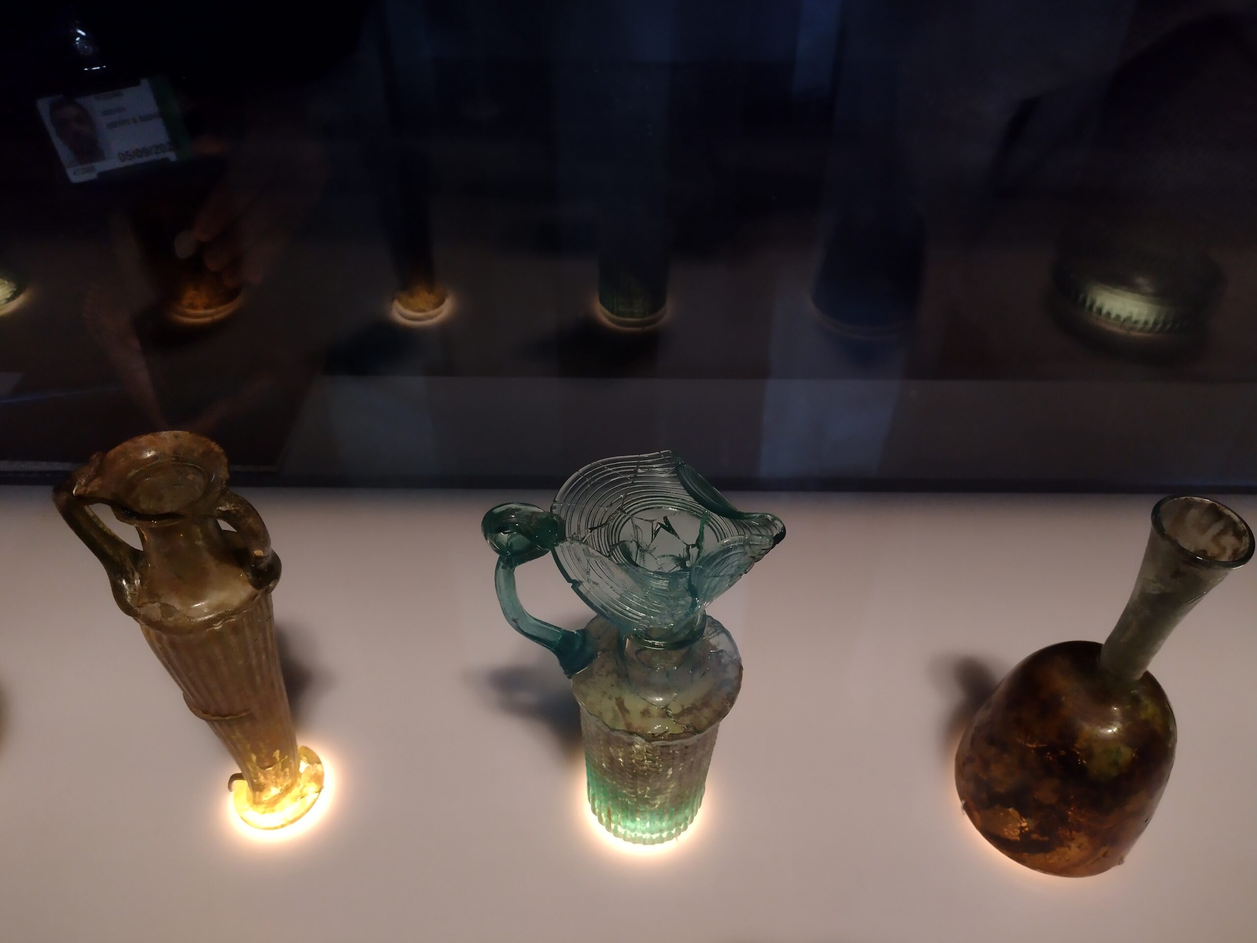 3 restored glass vessels on display in the Shattered Glass of Beirut exhibition at the British Museum