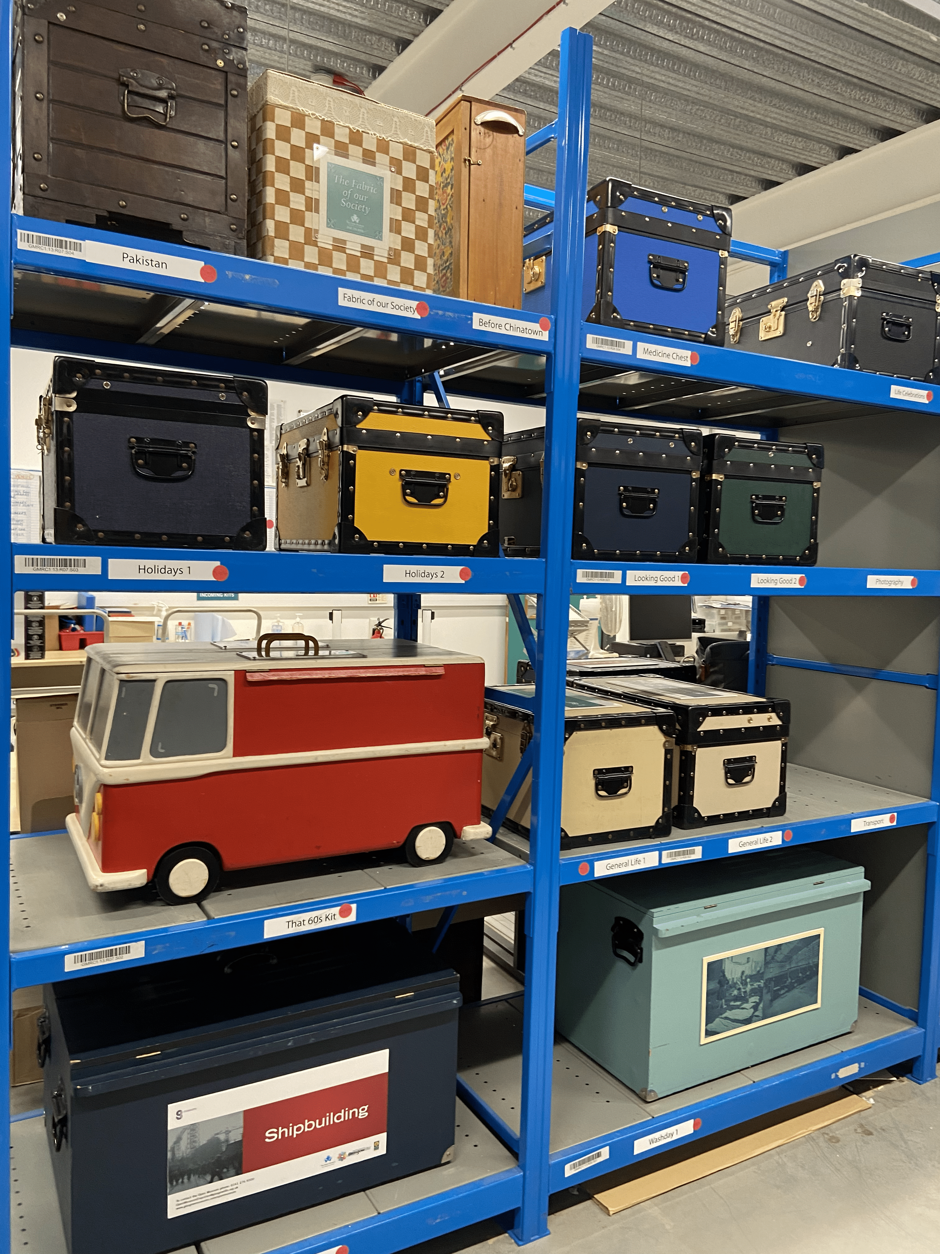 Glasgow Museums travelling exhibition kits on their shelves