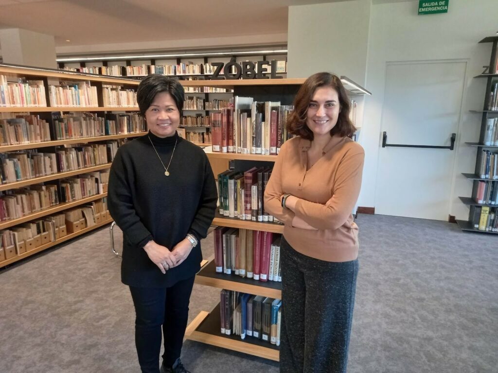 APRILLE TIJAM WITH INES VALLEJO, HEAD OF EXHIBITION PROJECT AT FUNDACION JUAN MARCH. 
BEHIND IS THE REFERENCE SECTION CONTAINING ALL THE BOOKS DONATED BY FERNANDO ZOBEL TO THE FUNDACION JUAN MARCH. 
