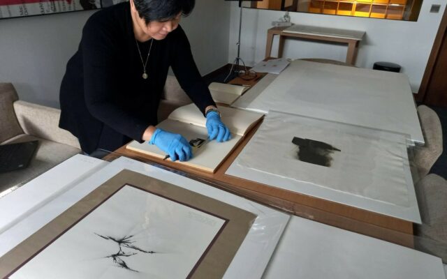 Aprille cataloguing prints from Fernando Zobel's collection
