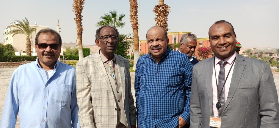 Yasser standing with colleagues outside the Nubia Museum