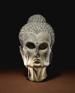 Carved sculpture of the head of a Fasting Buddha