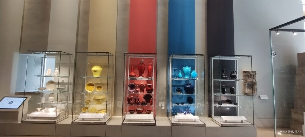Ceramics organised by colour on display at the Burrell Collection