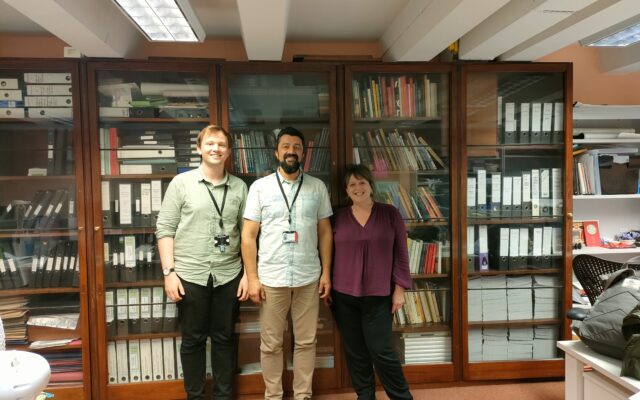 Ciprian standing for a photo with Claire Messenger, ITP Manager, and George Peckham, ITP Coordinator