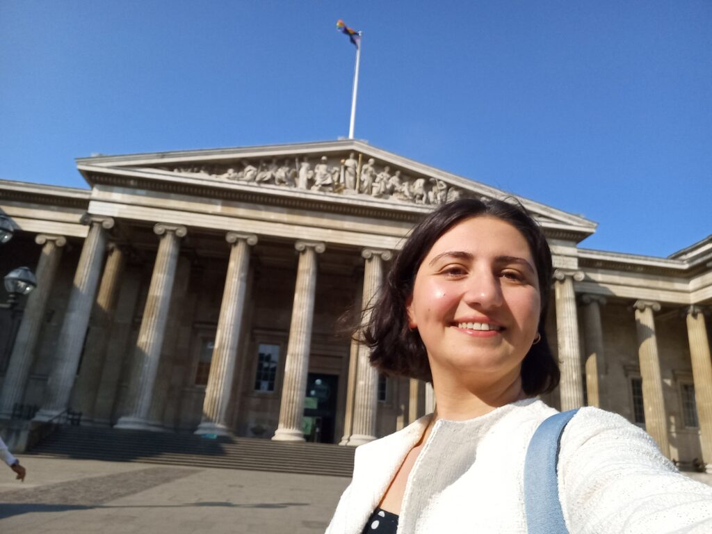 Elif smiling outside the British Museum.