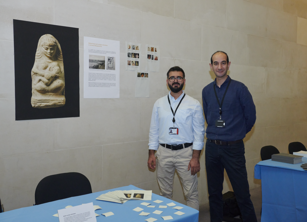 Fellows based in the Middle East department stand next to their object in focus display