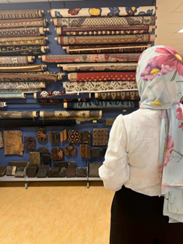 Nagwa Bakr looking at a museum display.