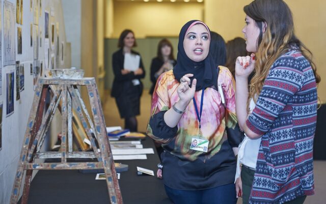 Hadeer speaking to a British Museum colleague during the ITP 2013.