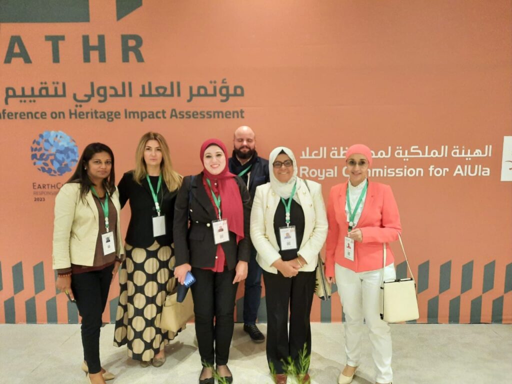 Shreen photographed with other participants of the ALULA International Conference.
