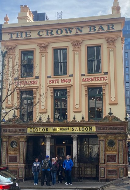 Photograph of the exterior of the Crown Liquor Saloon - an ornate cream and gold building.
