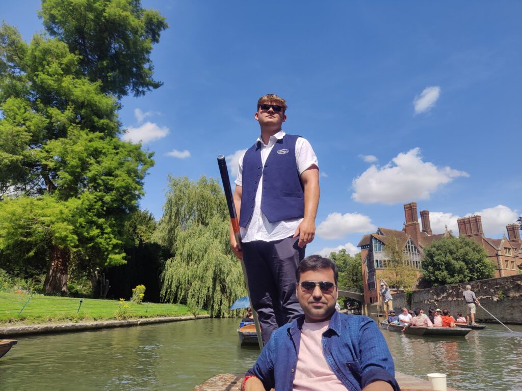 Photograph of Vinay on a punt in Cambridge