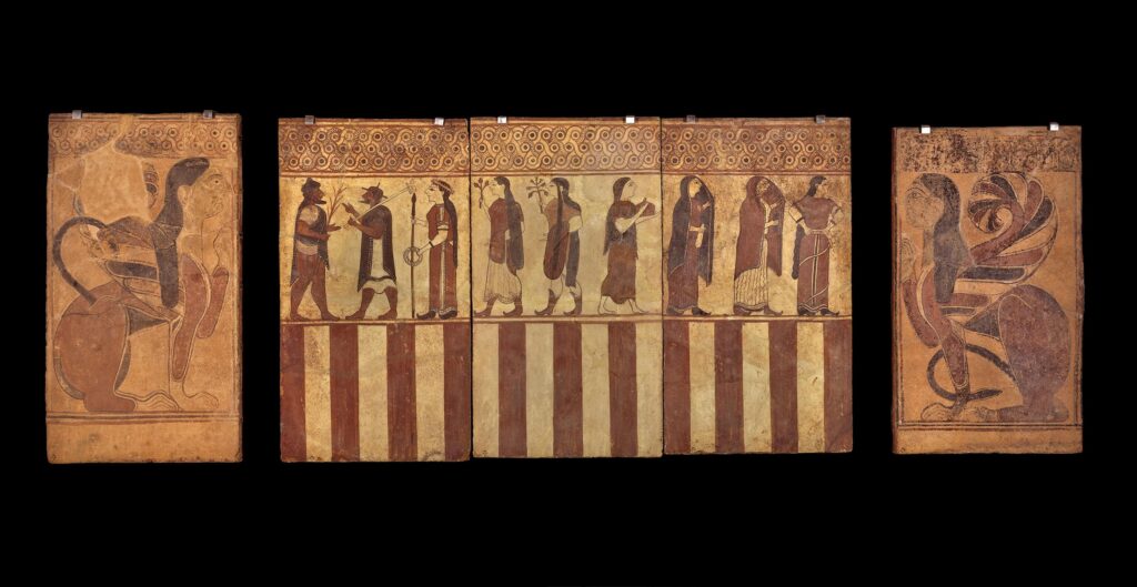 Etruscan tomb painting, five baked clay panels bearing painted representations of sphinxes and groups of three figures