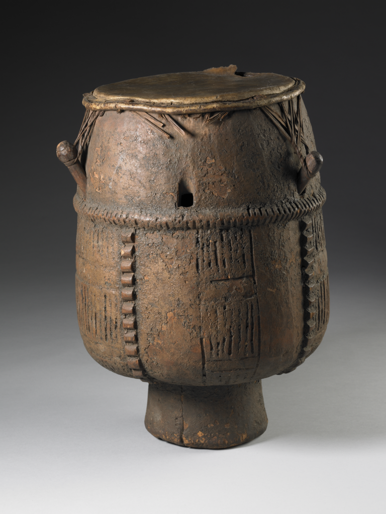Akan drum: drum made of wood, skin and cord. 