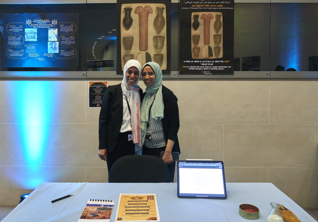 Object in focus Egypt and Sudan group standing their their project