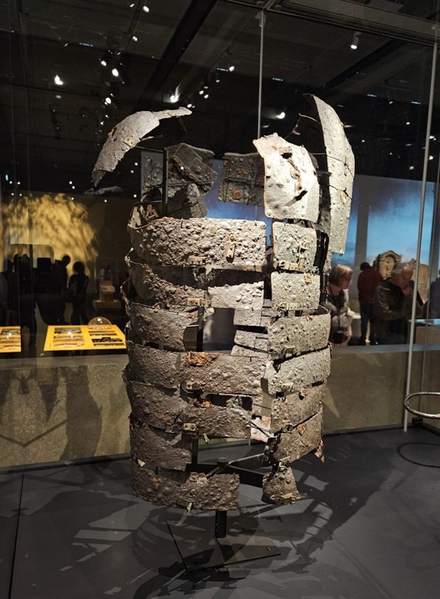 Photograph of a corroded armour