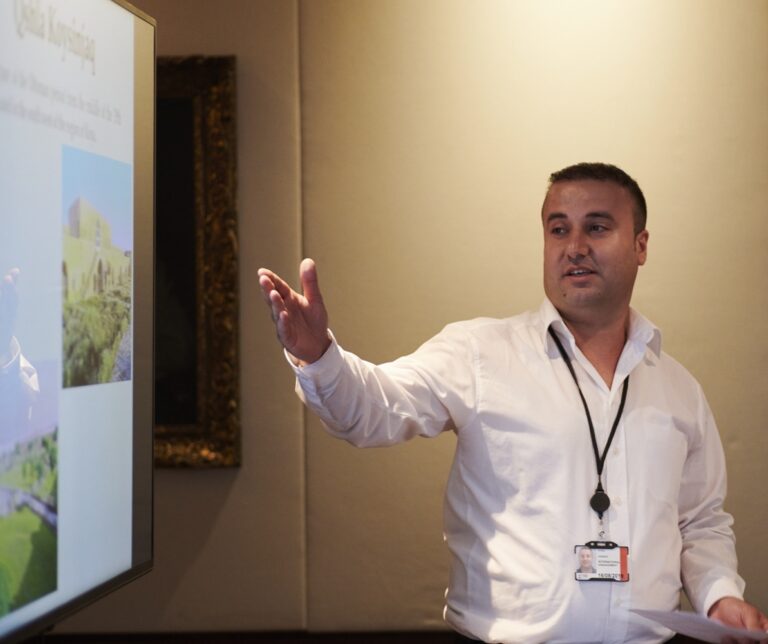 Photograph of a man presenting