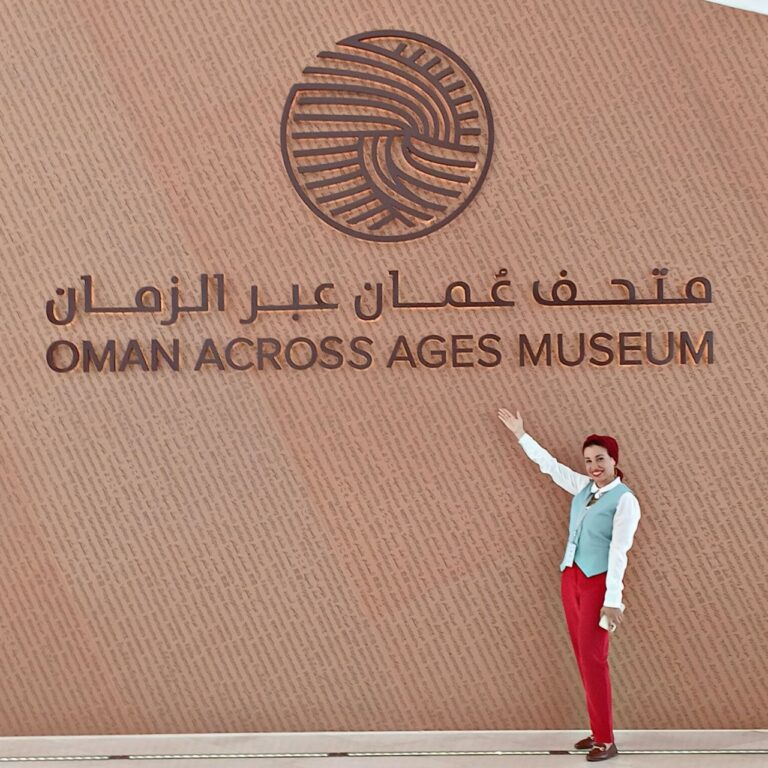 Woman standing outside Oman Across Ages Museum