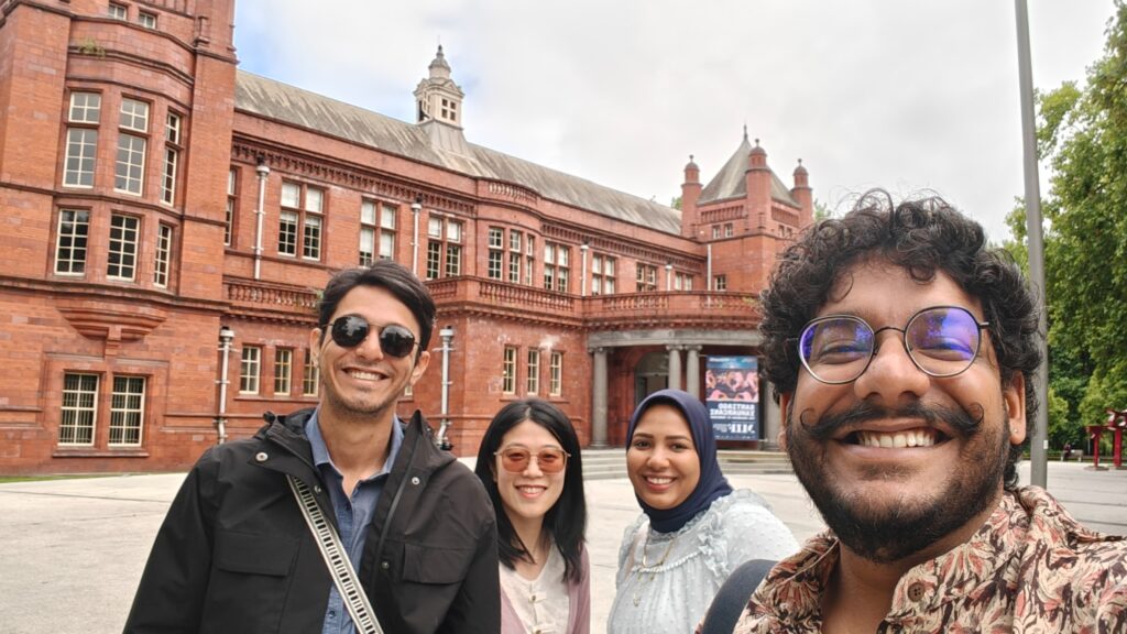 Four people taking a selfie