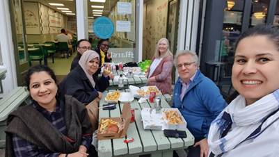 Six people eating fish and chips