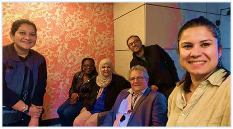 Six people posing for a photo